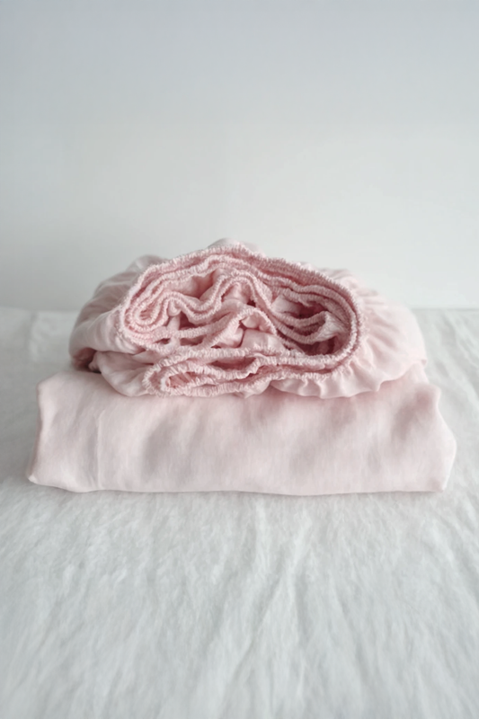 Pastel pink linen fitted sheet